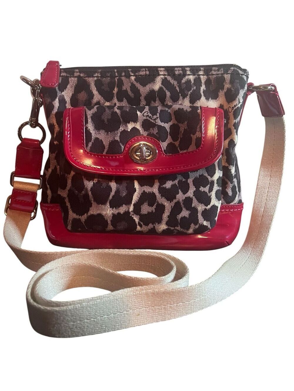 C31. Coach Park Ocelot Print Swingpack Crossbody Bag (Style F49441)
